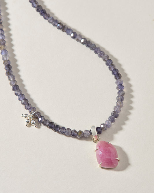 Iolite beaded necklace with one-of-a-kind pink sapphire pendant hand-set in sterling silver
