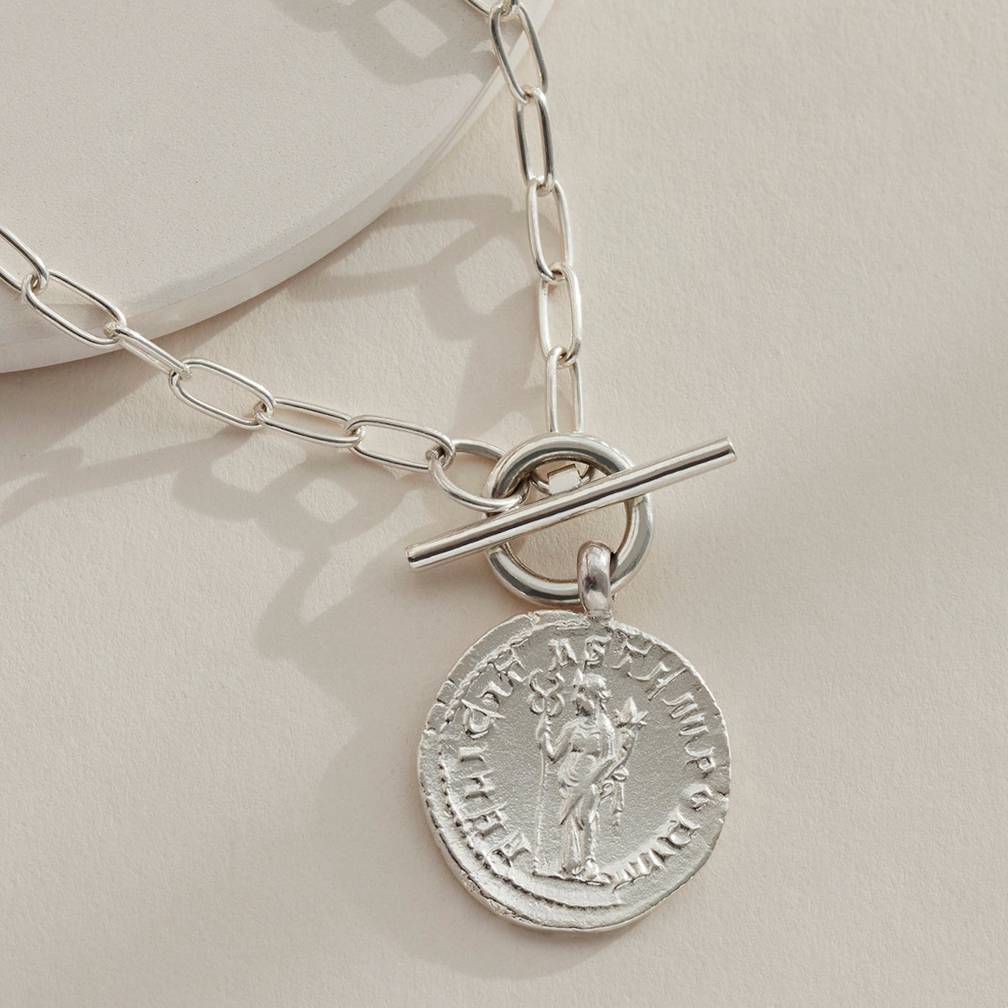 Close up of Goddess Coin Necklace in SIlver