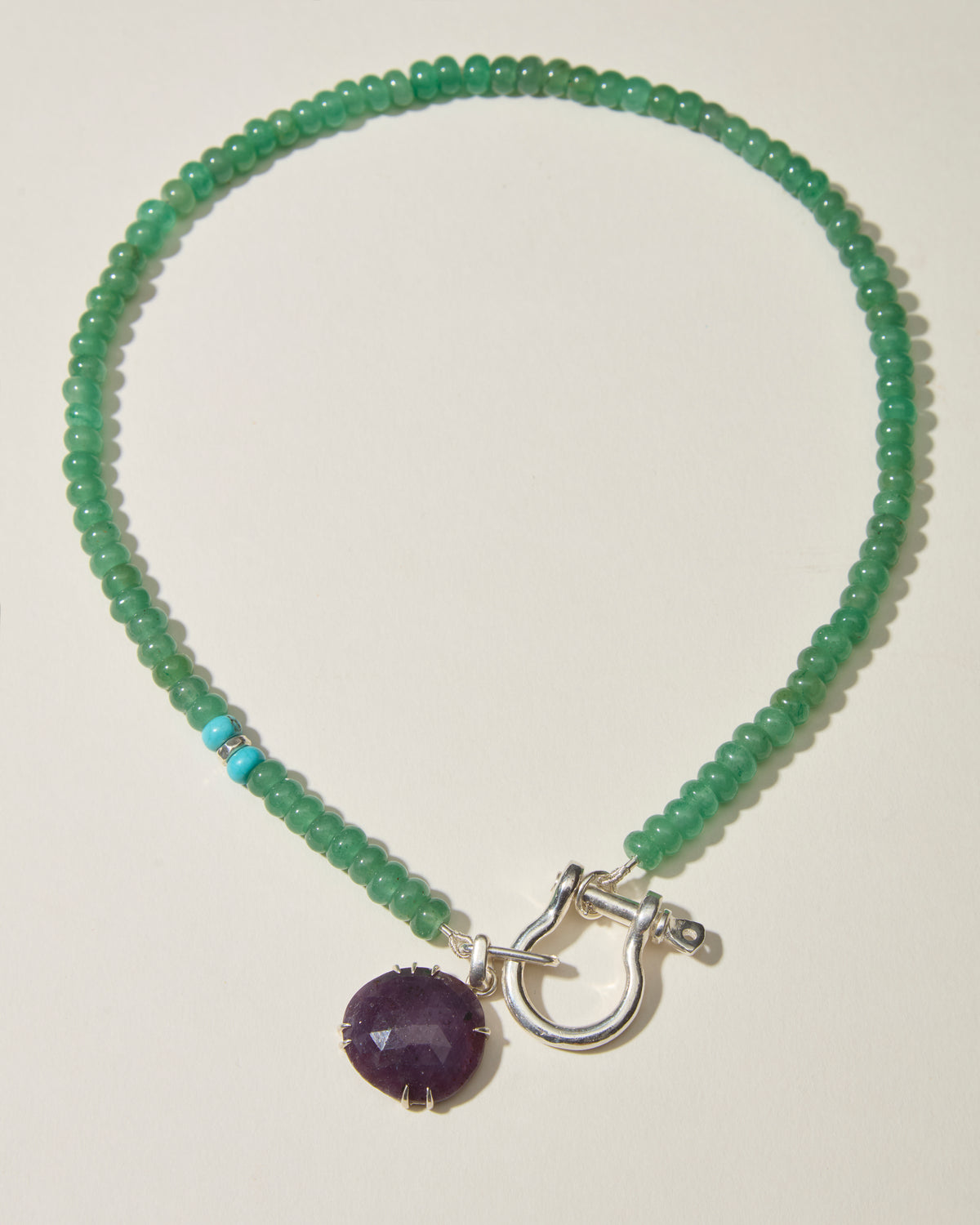 Full green aventurine beaded necklace with turquoise accents, sterling silver shackle and purple sapphire