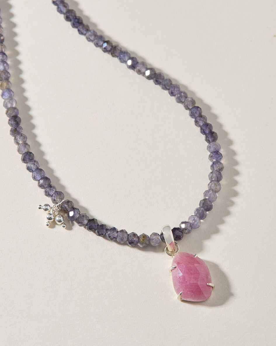 Iolite beaded necklace with one-of-a-kind pink sapphire pendant hand-set in sterling silver