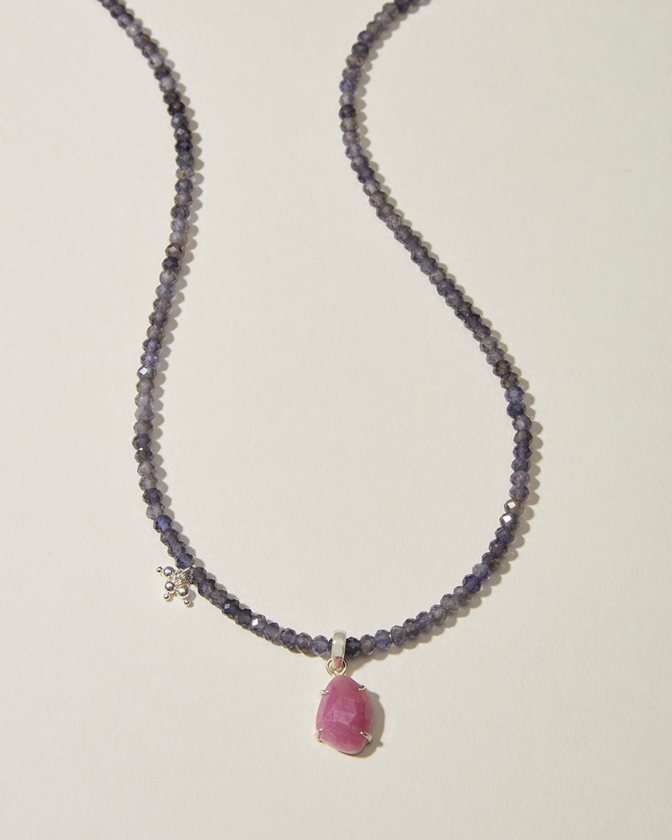 Full iolite gemstone necklace with natural pink sapphire pendant and sterling silver detail