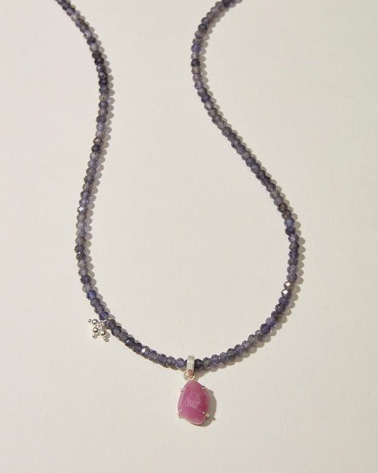 Full iolite gemstone necklace with natural pink sapphire pendant and sterling silver detail