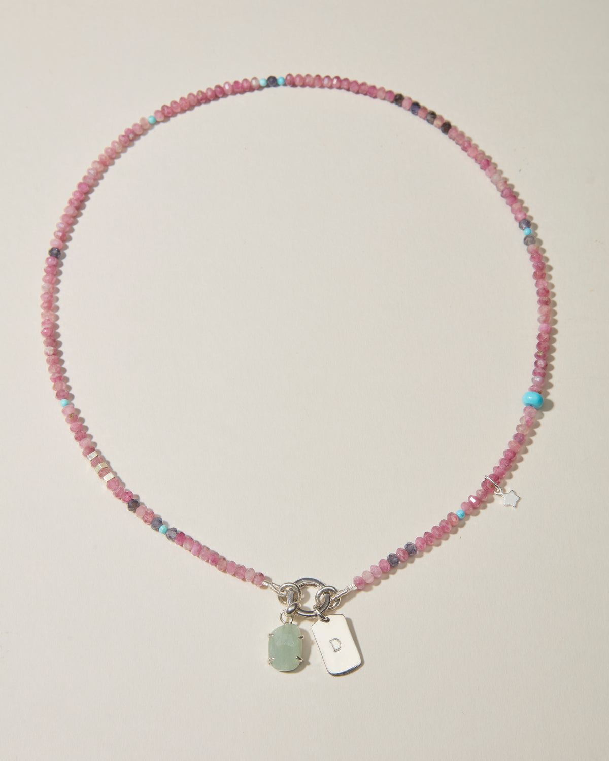 Full pink tourmaline beaded necklace with personalised silver dog tag, aquamarine charm and gemstone accents