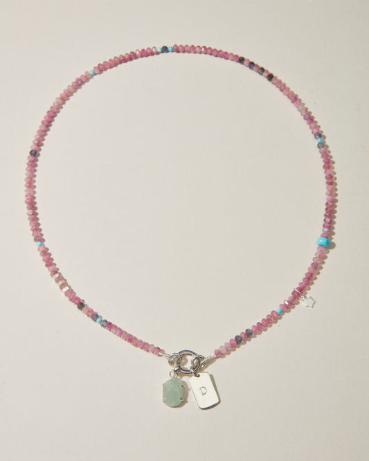 Full pink tourmaline beaded necklace with personalised silver dog tag, aquamarine charm and gemstone accents