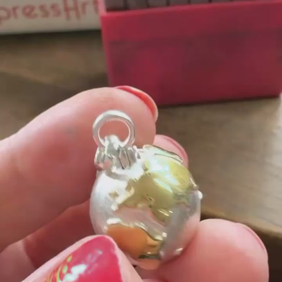 My World Globe Locket Necklace Videos from Instagram