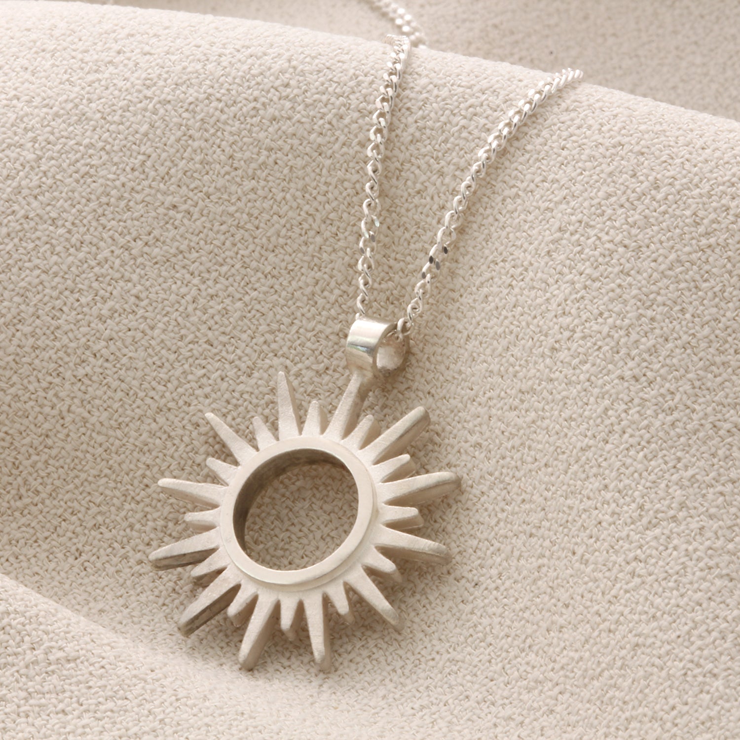 Silver sun pendant necklace deals